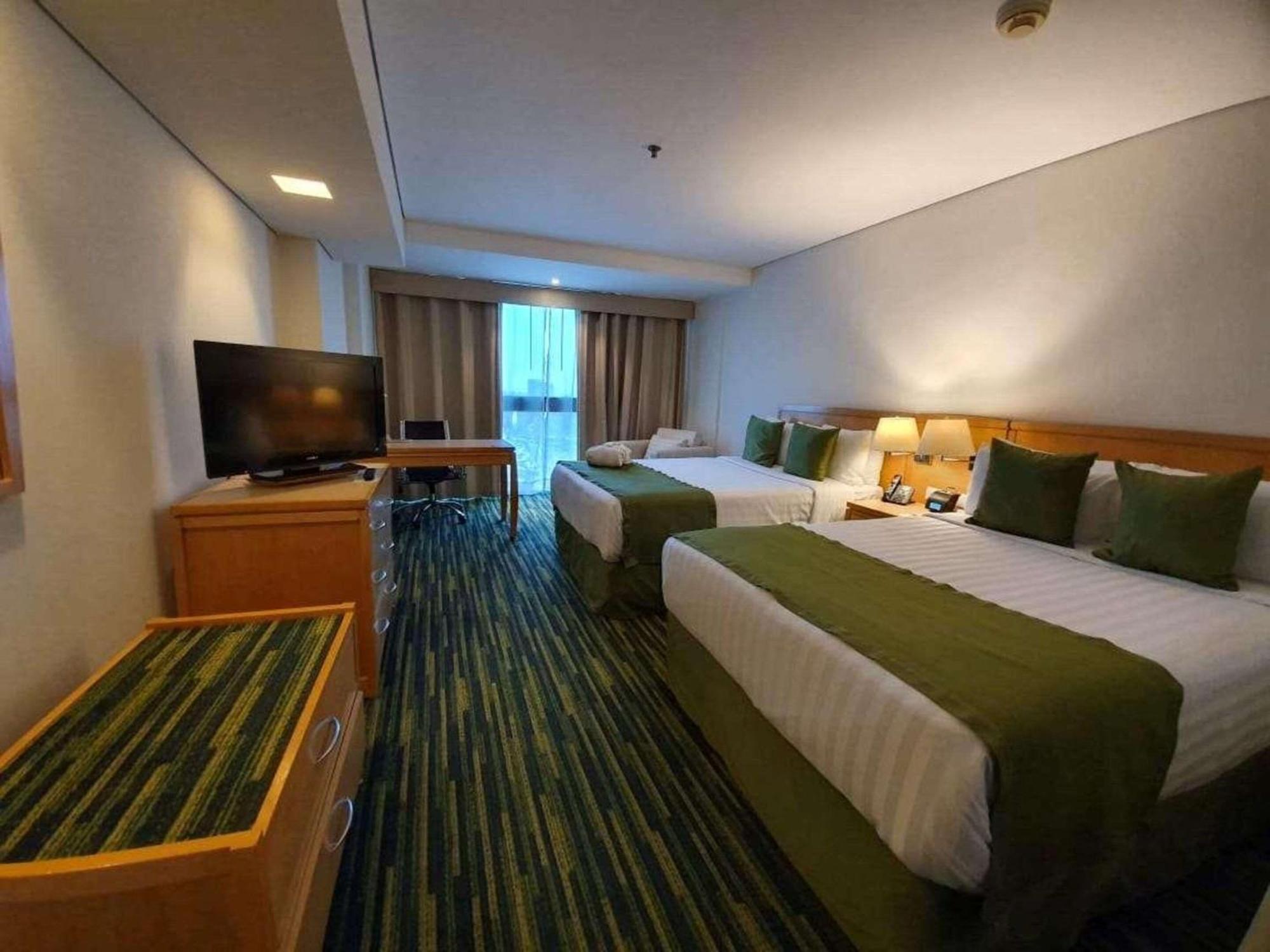Radisson Paraiso Hotel Cidade do México Exterior foto A room at the hotel