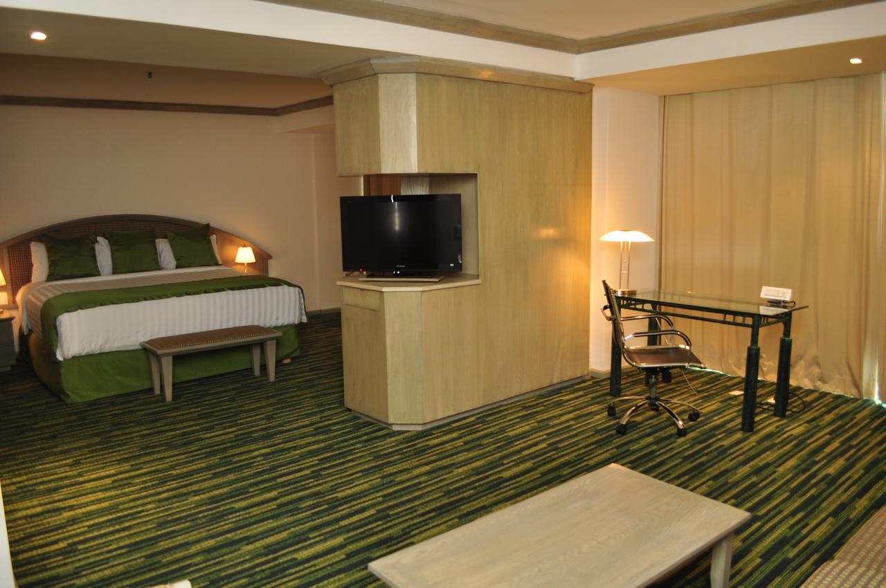 Radisson Paraiso Hotel Cidade do México Exterior foto A room at the hotel