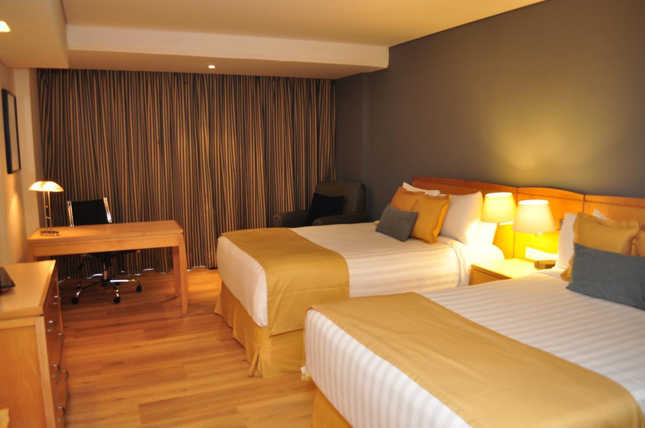 Radisson Paraiso Hotel Cidade do México Exterior foto A room at the hotel